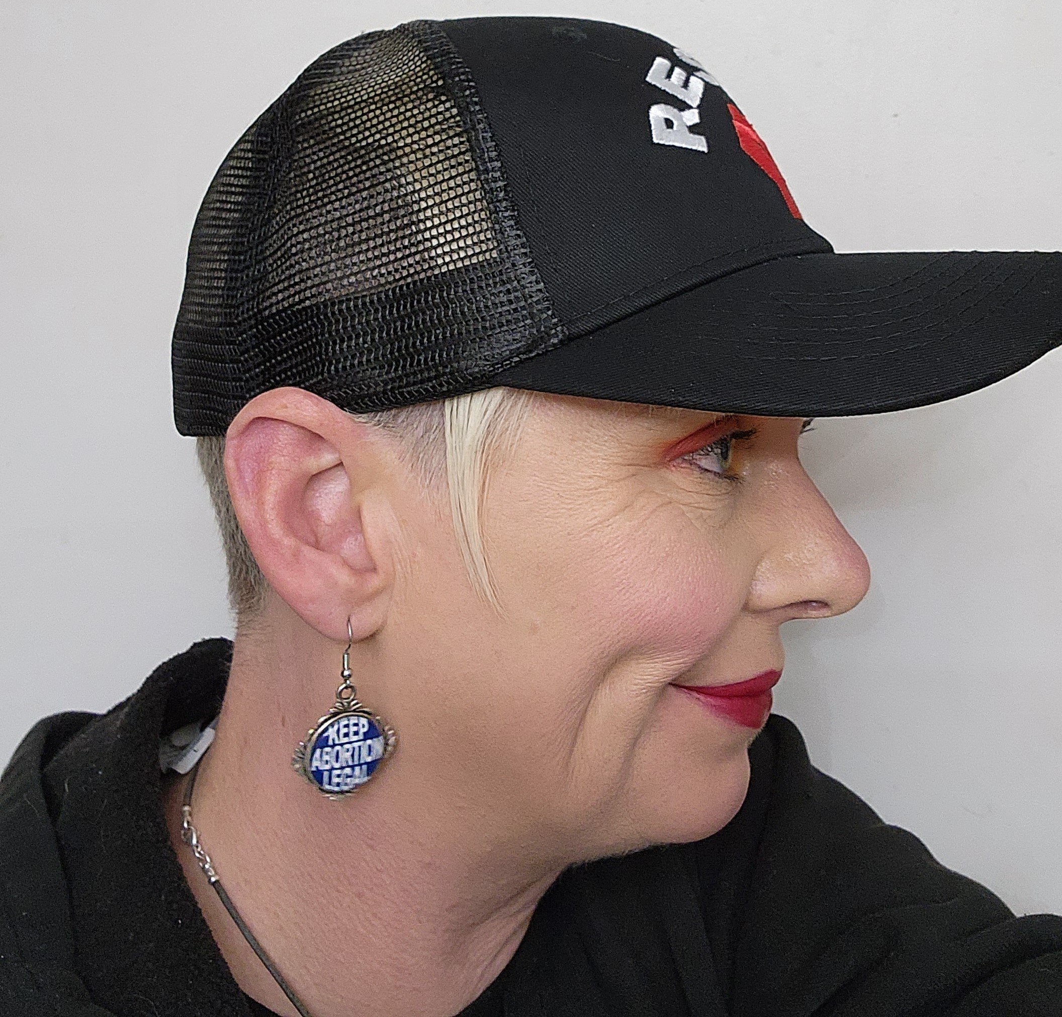 Resist Solidarity Fist Trucker Hat